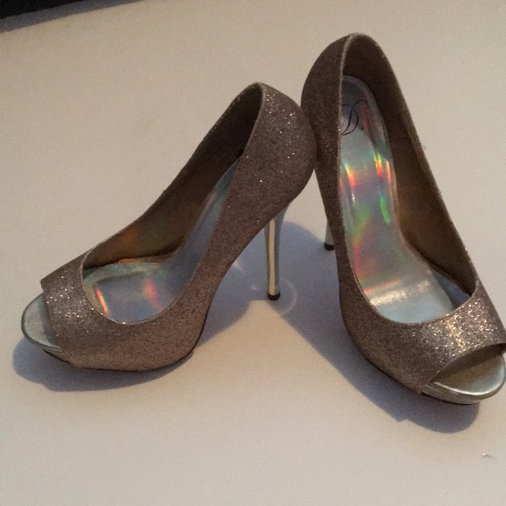 Gold sparkly stilettos